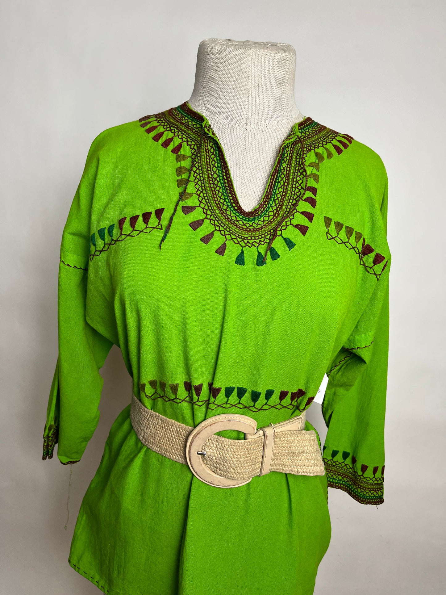 Green tribal embroidered top