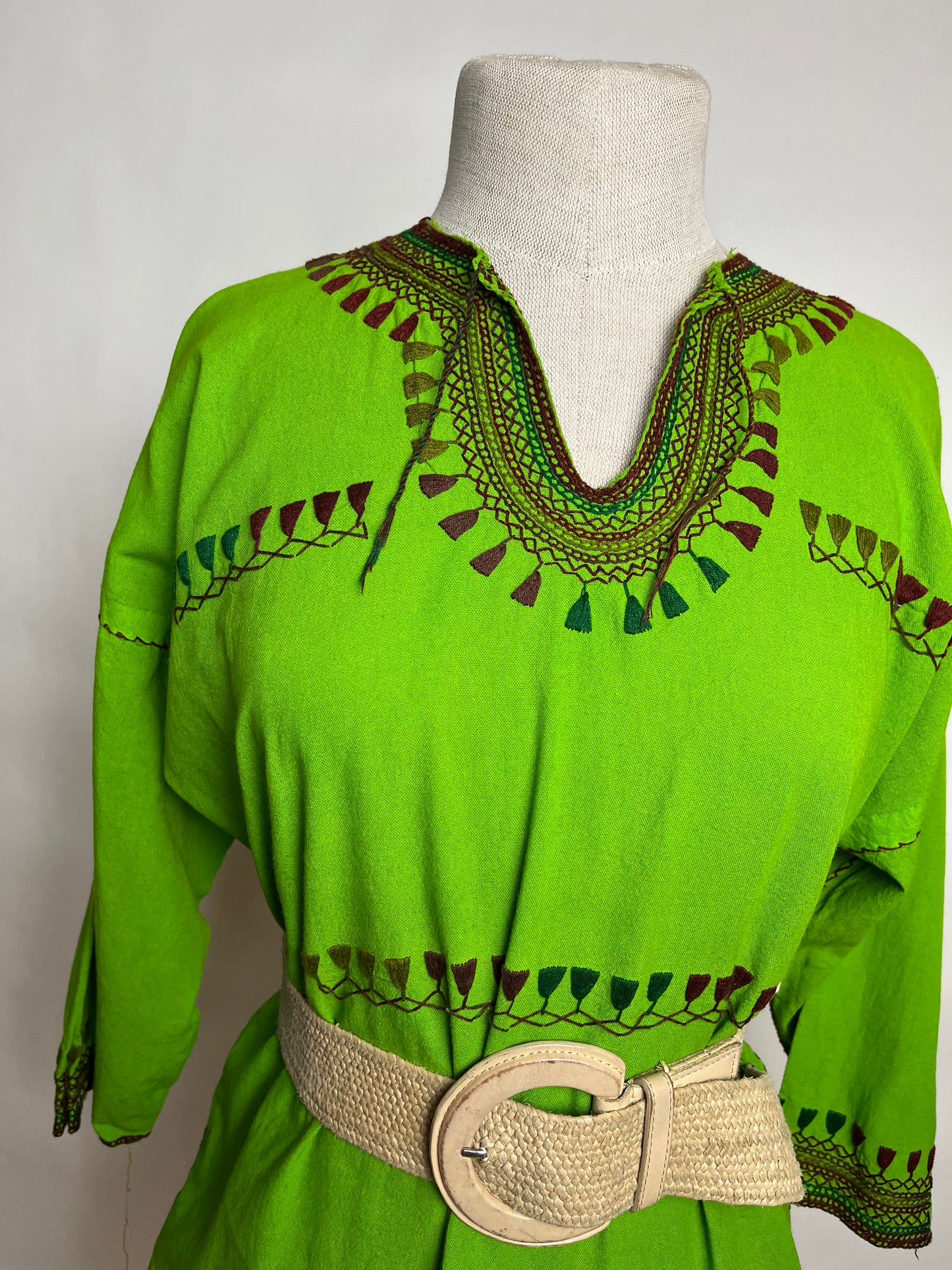 Green tribal embroidered top
