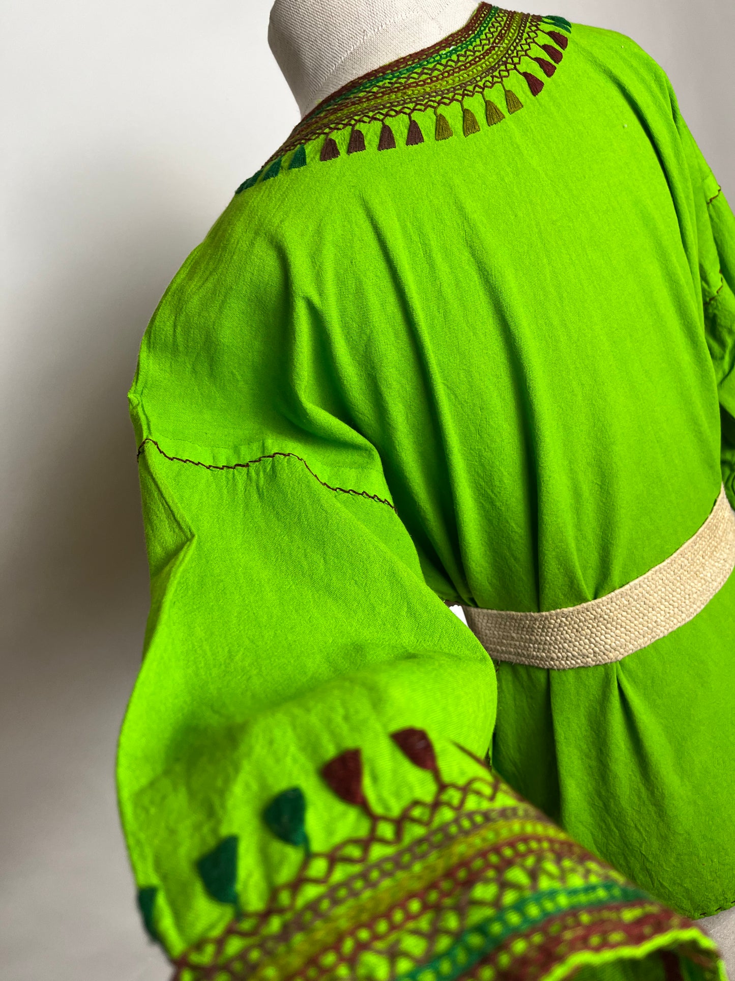 Green tribal embroidered top