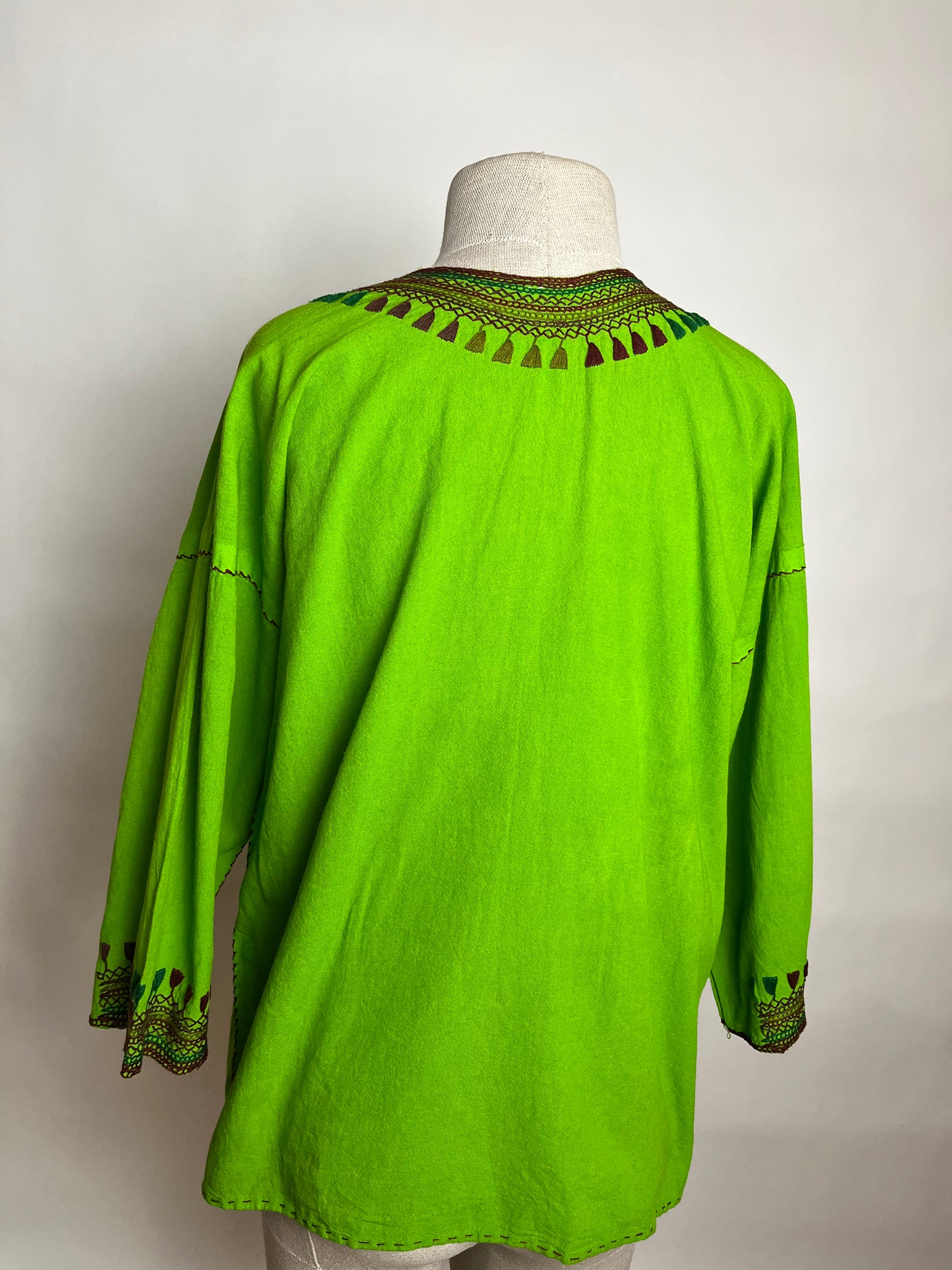 Green tribal embroidered top