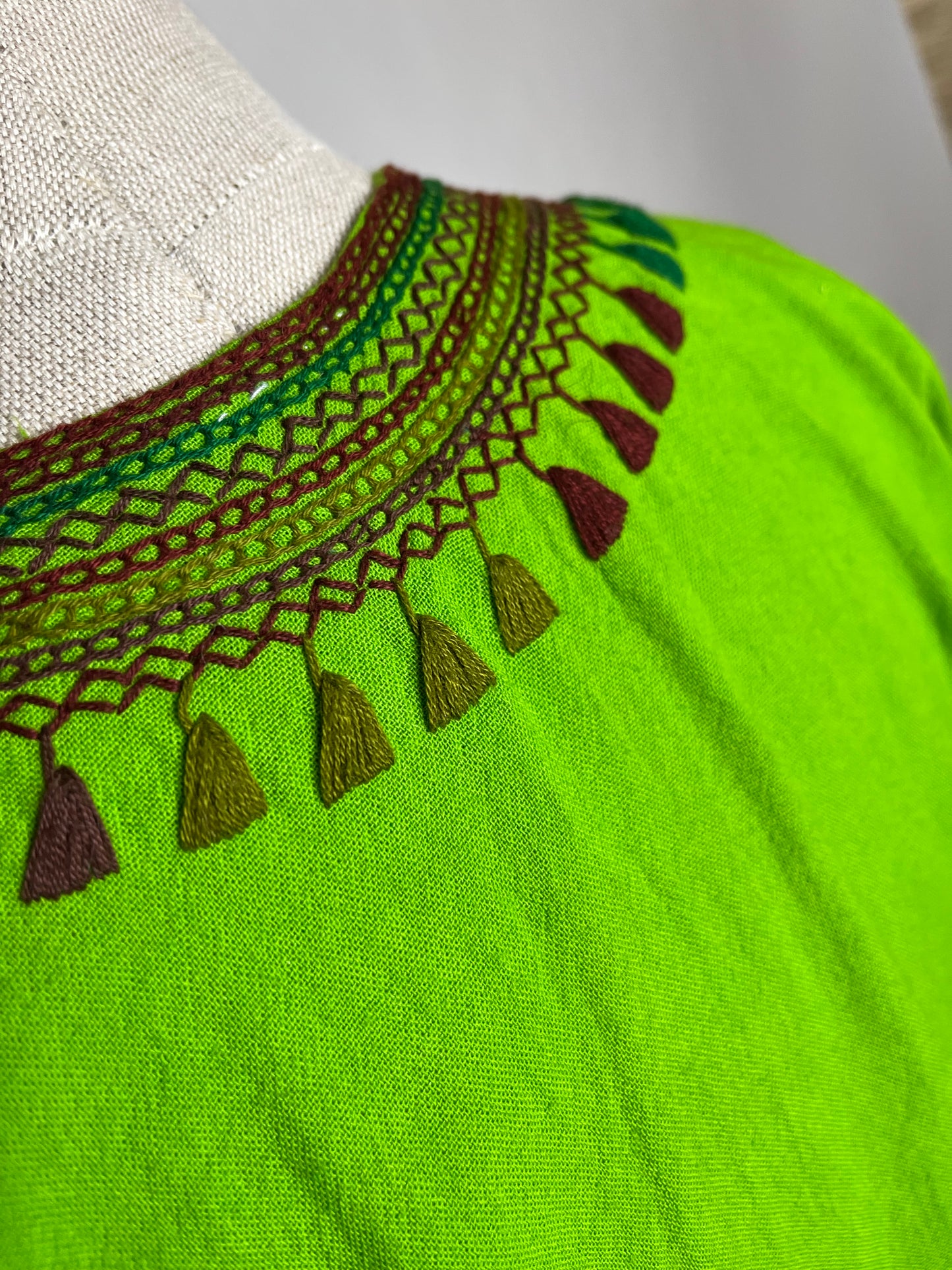Green tribal embroidered top