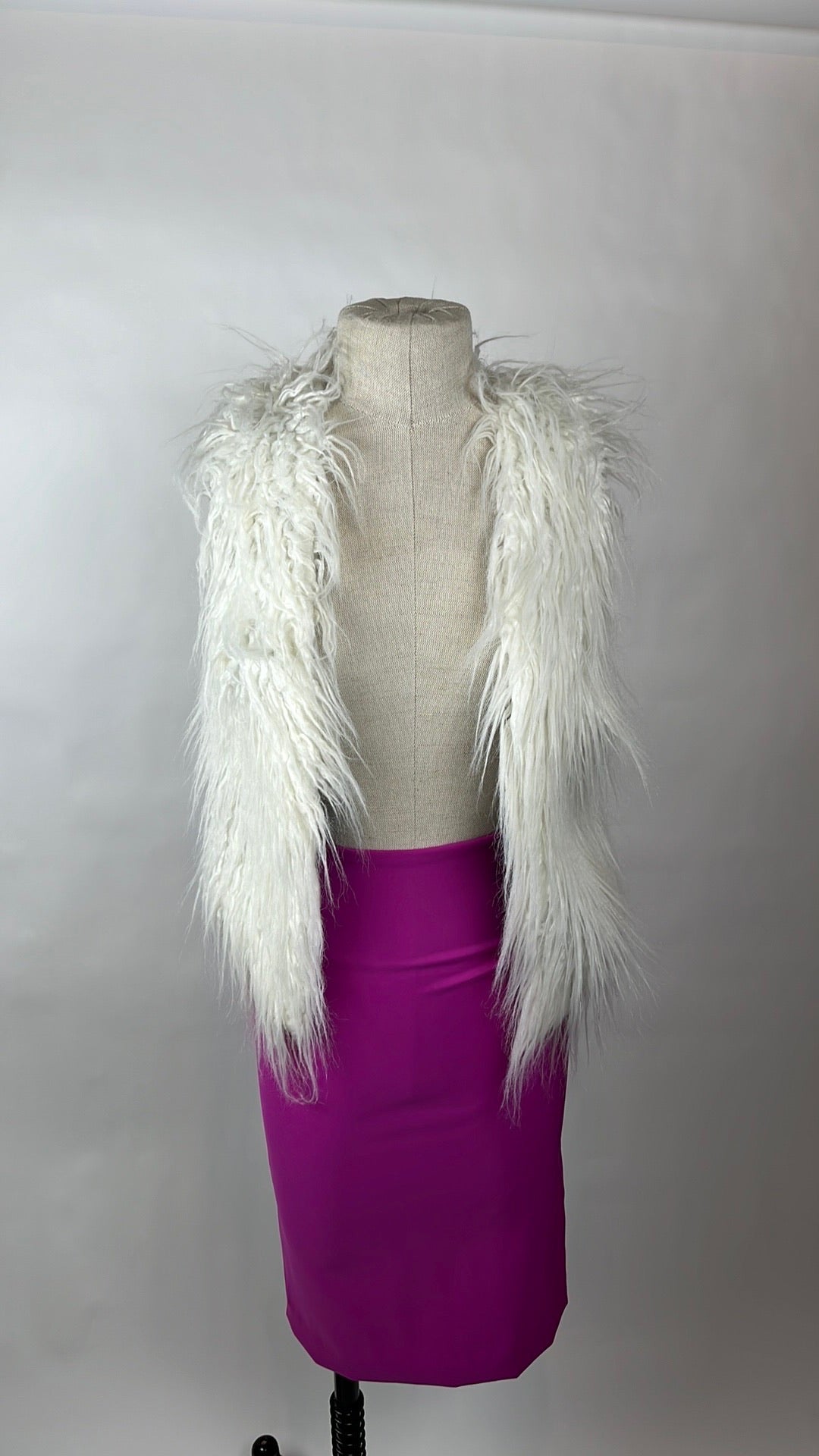 white faux fur winter vest