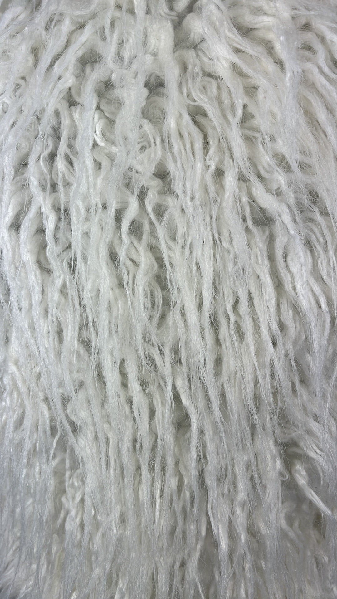 white faux fur winter vest