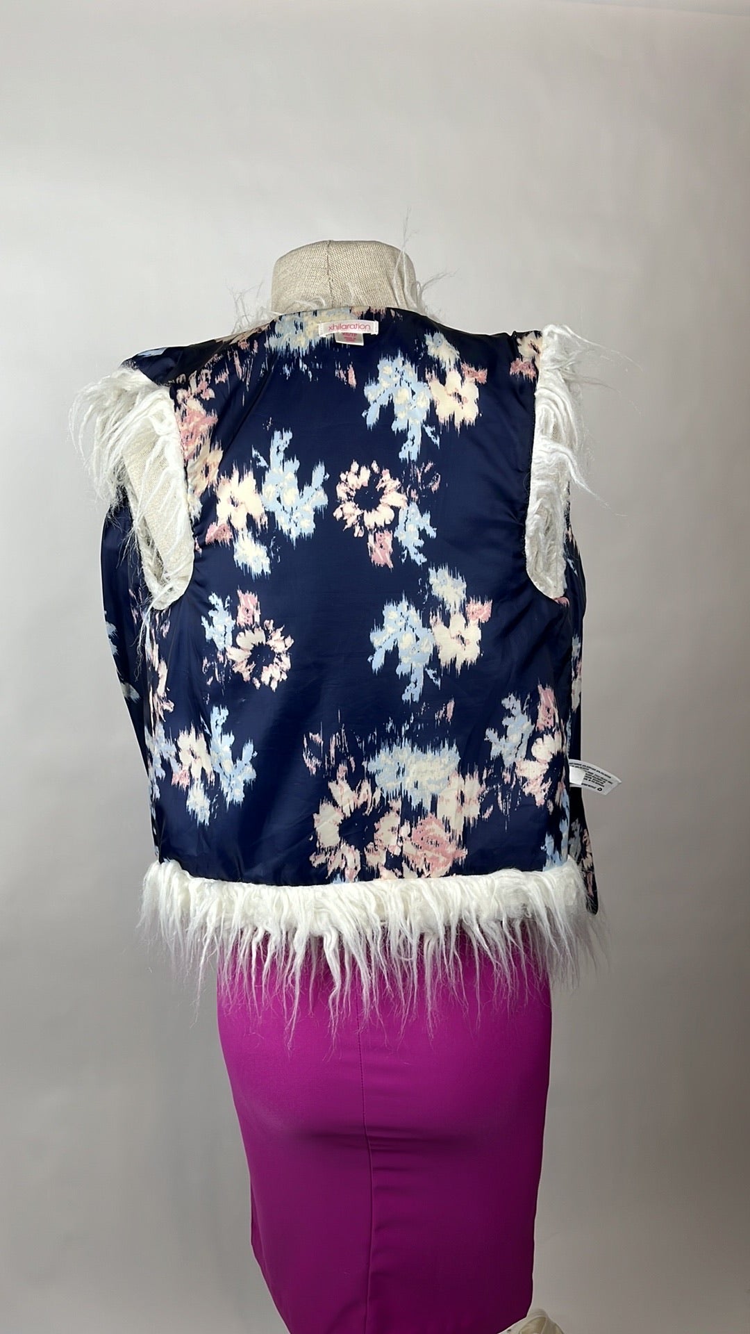 white faux fur winter vest