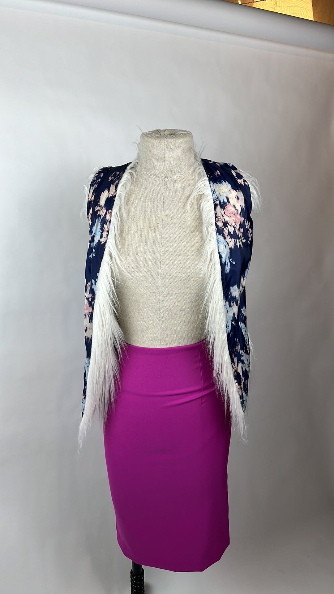 white faux fur winter vest