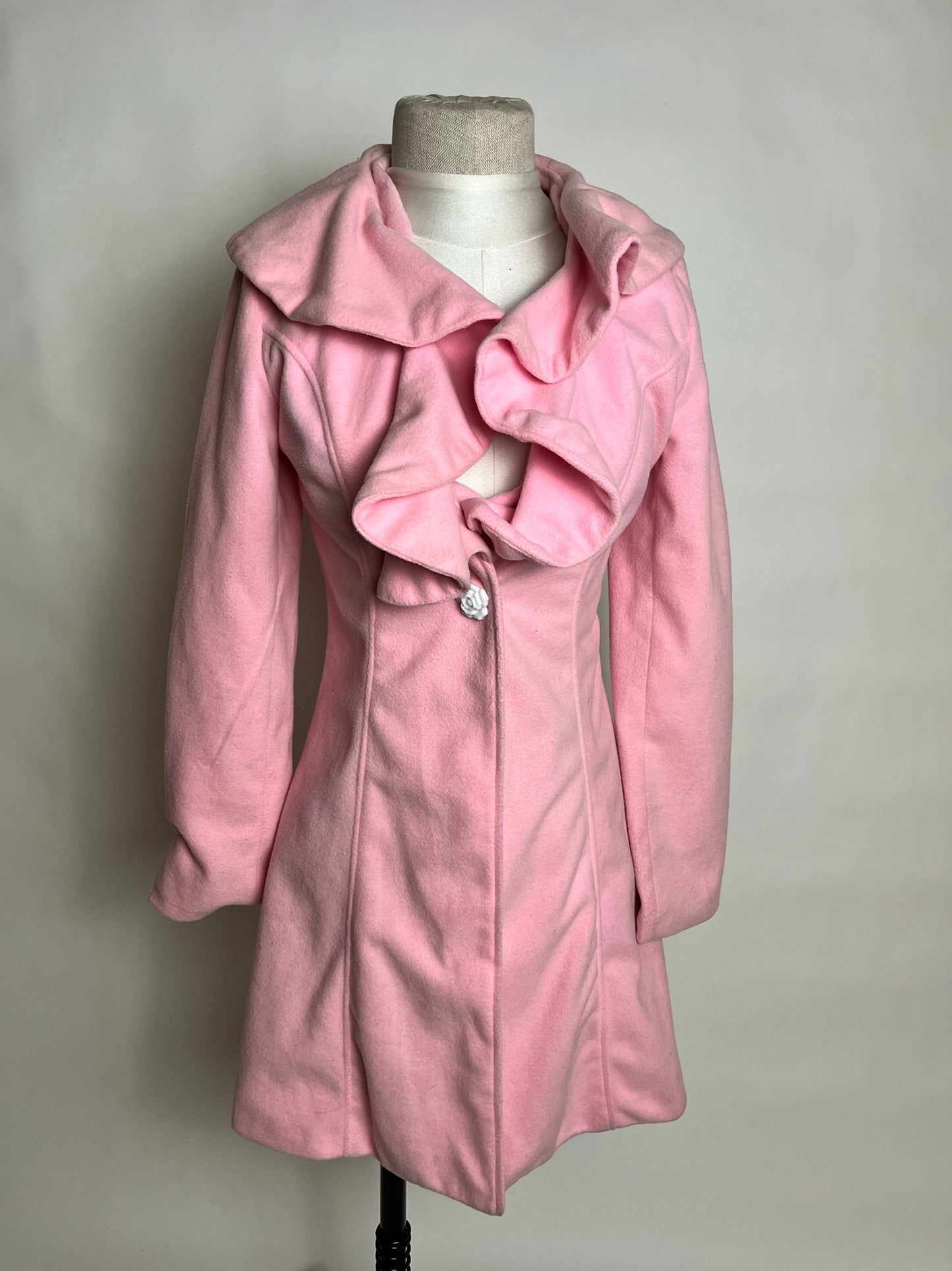 pink peacoat with flower buttons