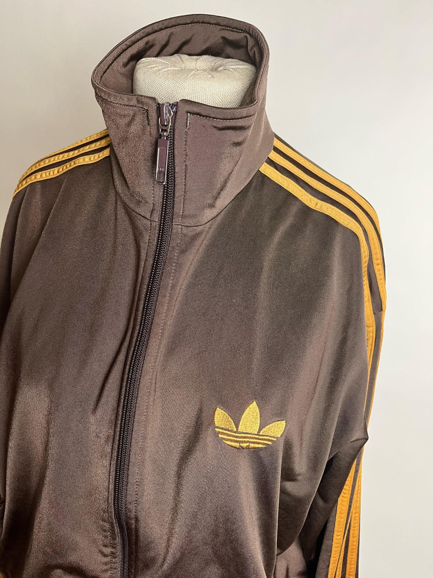 large brown adidas jacket