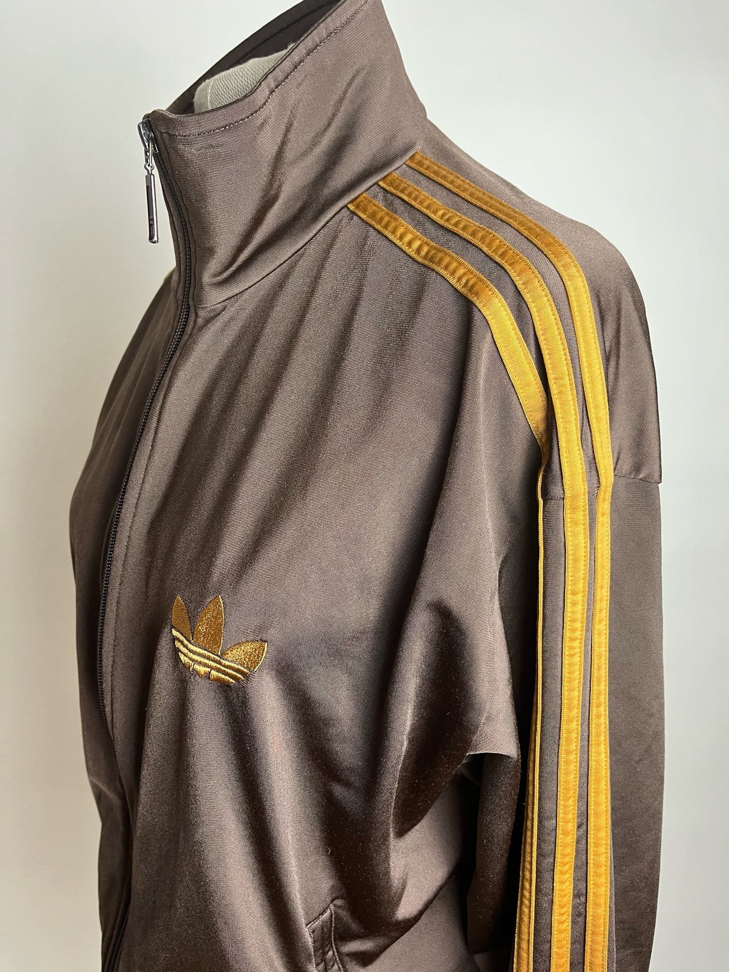 large brown adidas jacket