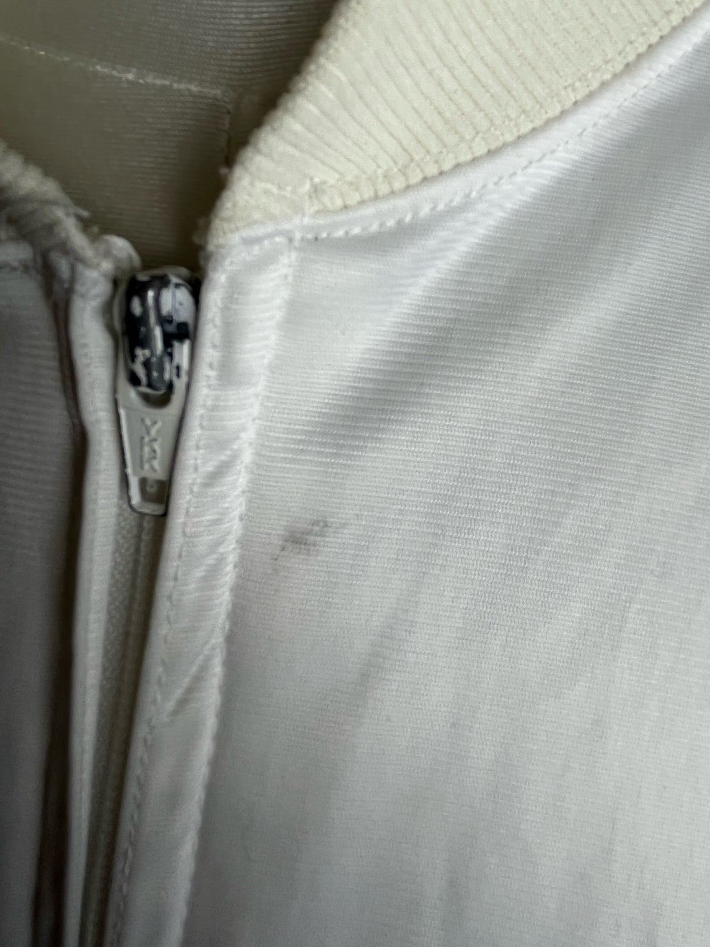 white and baby blue adidas jacket